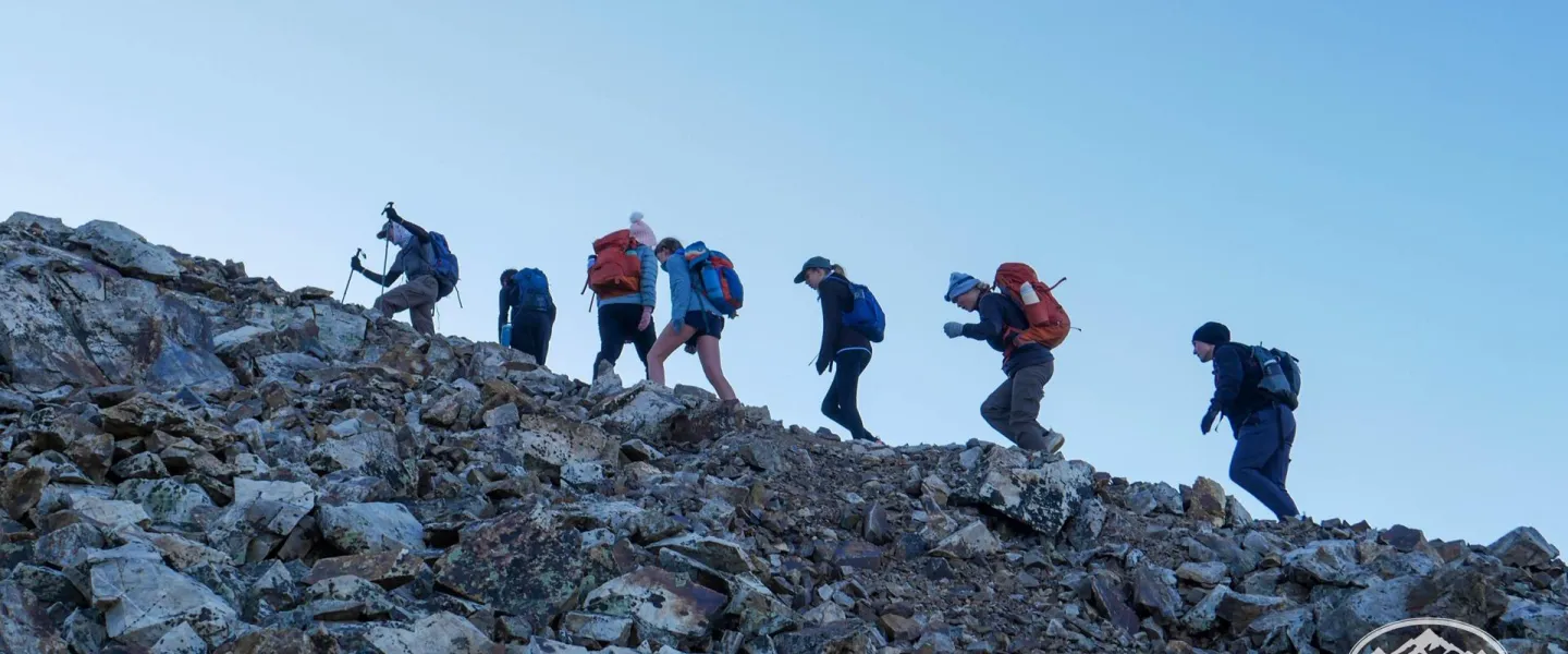 Climbing uphill at Camp Tumbleson teen expedition camps
