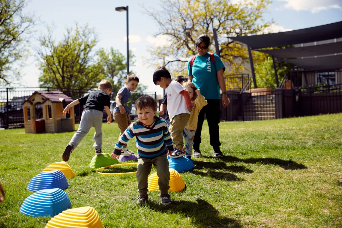 kids playing boulder